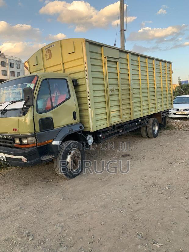 Mitsubishi Fh KBP 2010 Yellow - thumbnail 2