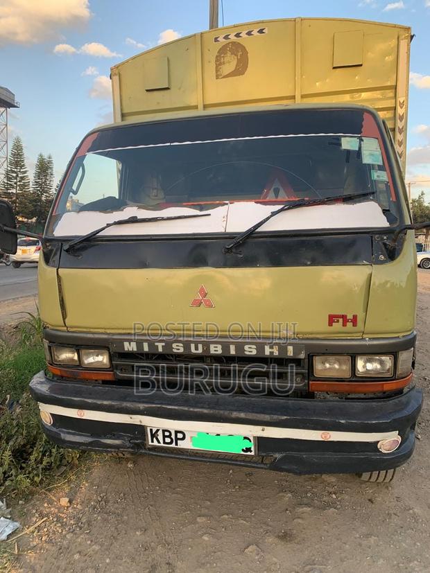 Mitsubishi Fh KBP 2010 Yellow - thumbnail 3