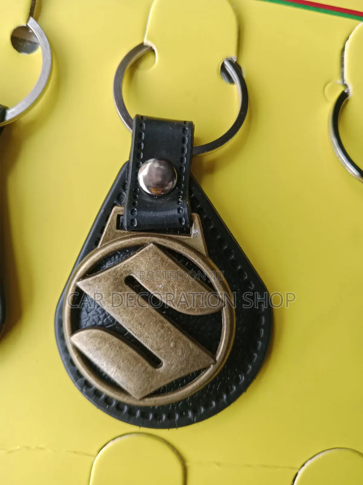 Suzuki Metal Emblem Key Fob With Black Leather Backing