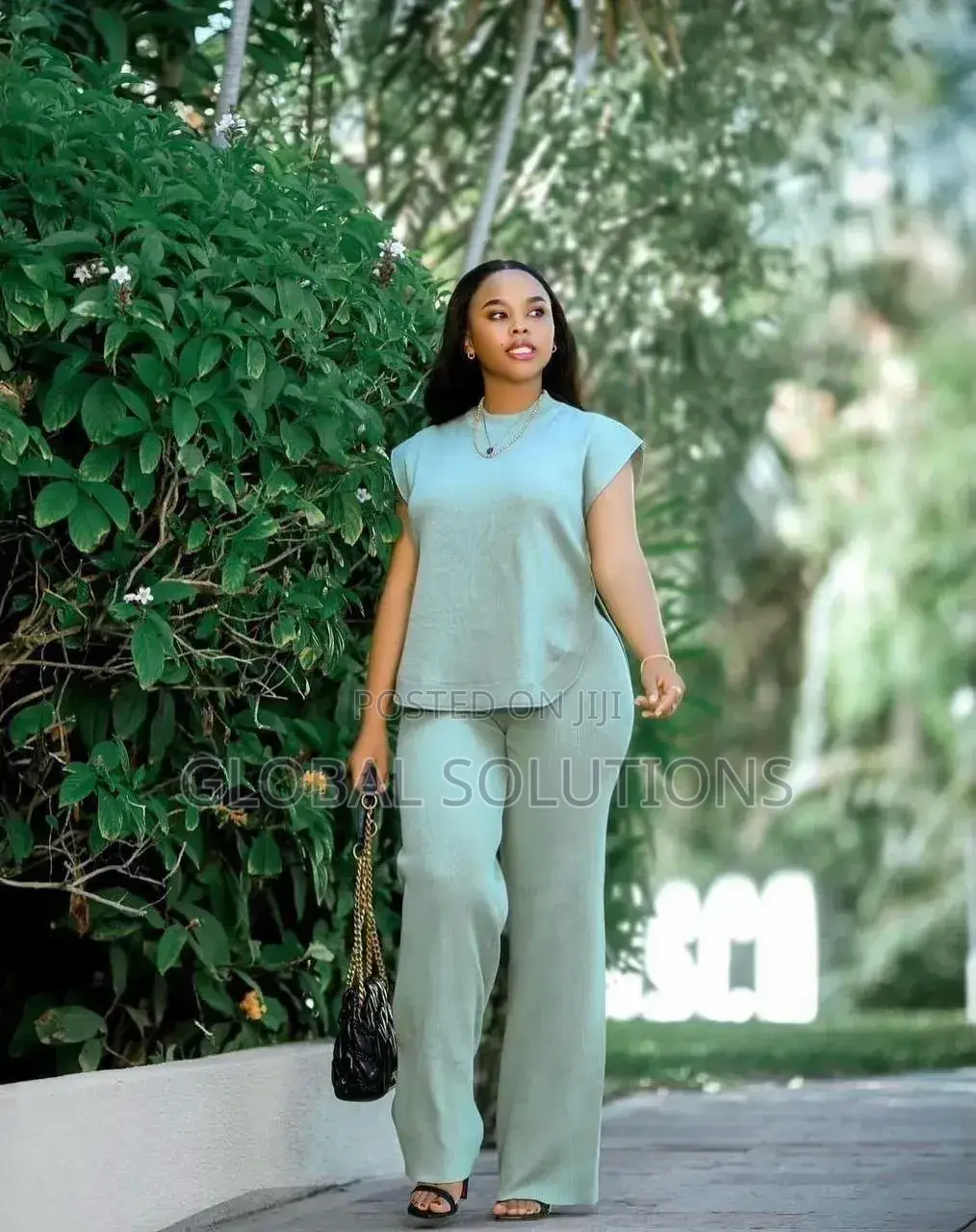 Knitted Two-Piece Set With a Short-Sleeved Top and Matching Trousers