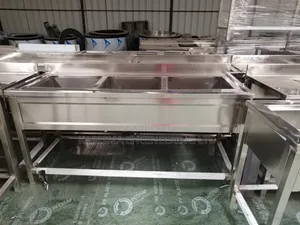 Commercial Stainless Steel Triple Sinks.