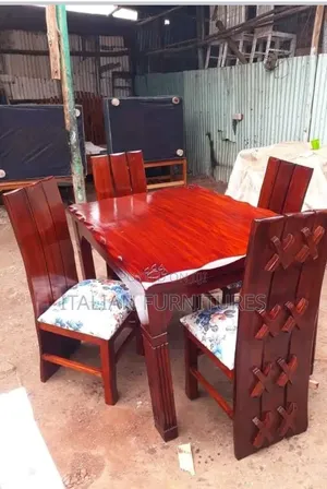 It's a Dining Table With 4 Chairs Classic