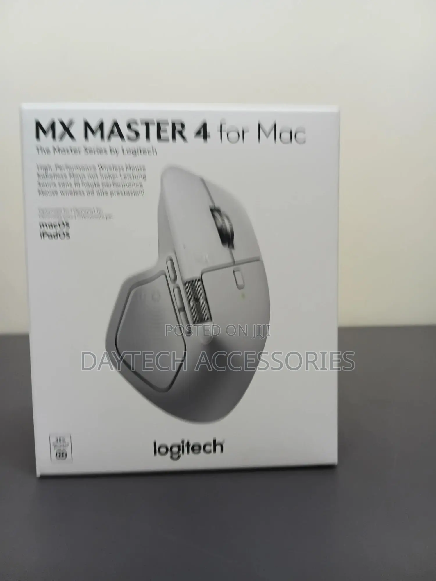 This Is a Logitech Mx Master 4 for Mac Wireless Mouse in Pale Gray.