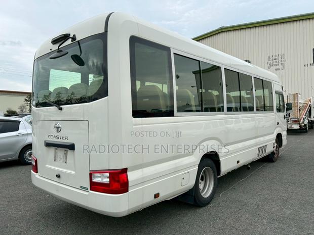 Toyota Coaster 2019 White - thumbnail 3