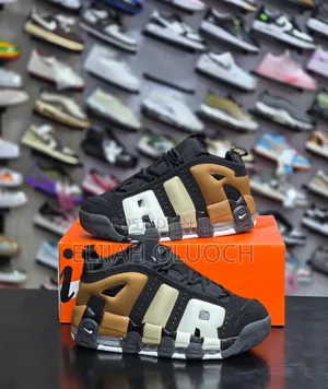 Nike Air More Uptempo Low Sneakers in a Black and Gum Medium Brown