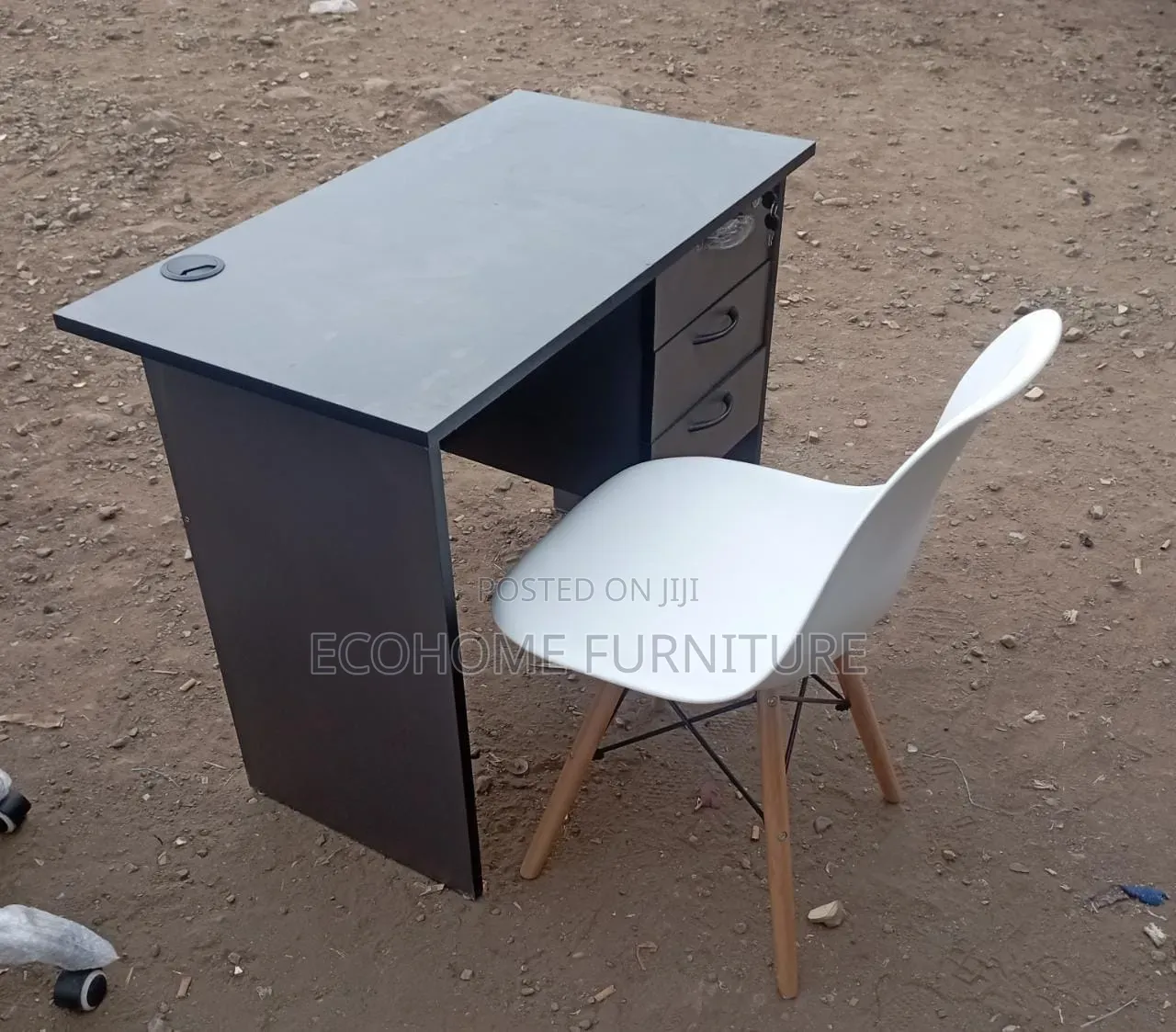 Study Desk With 3 Drawer Side and a White Eames Chair