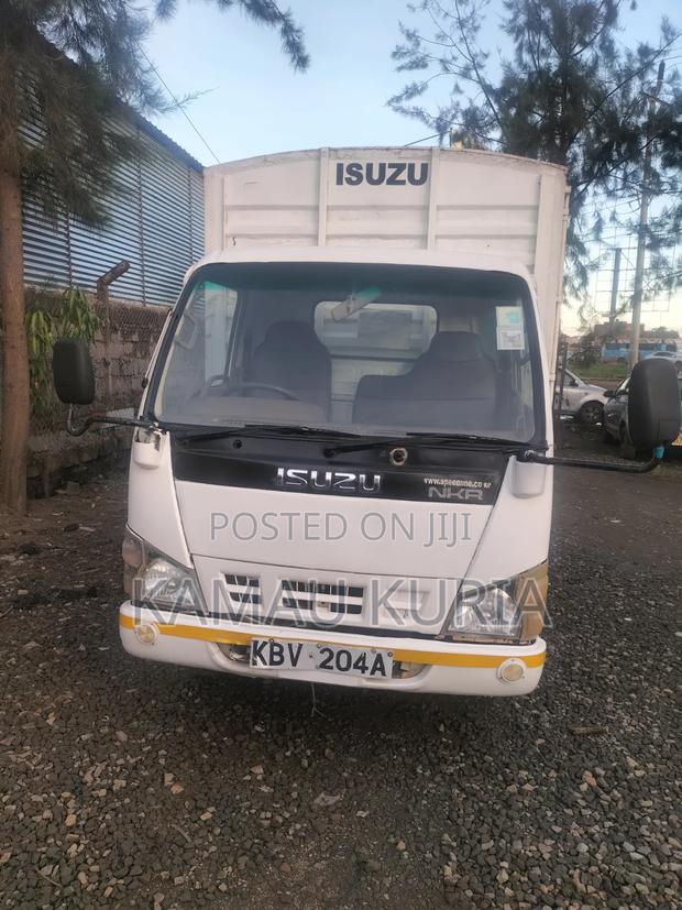 Isuzu NKR 2012 White - thumbnail 2