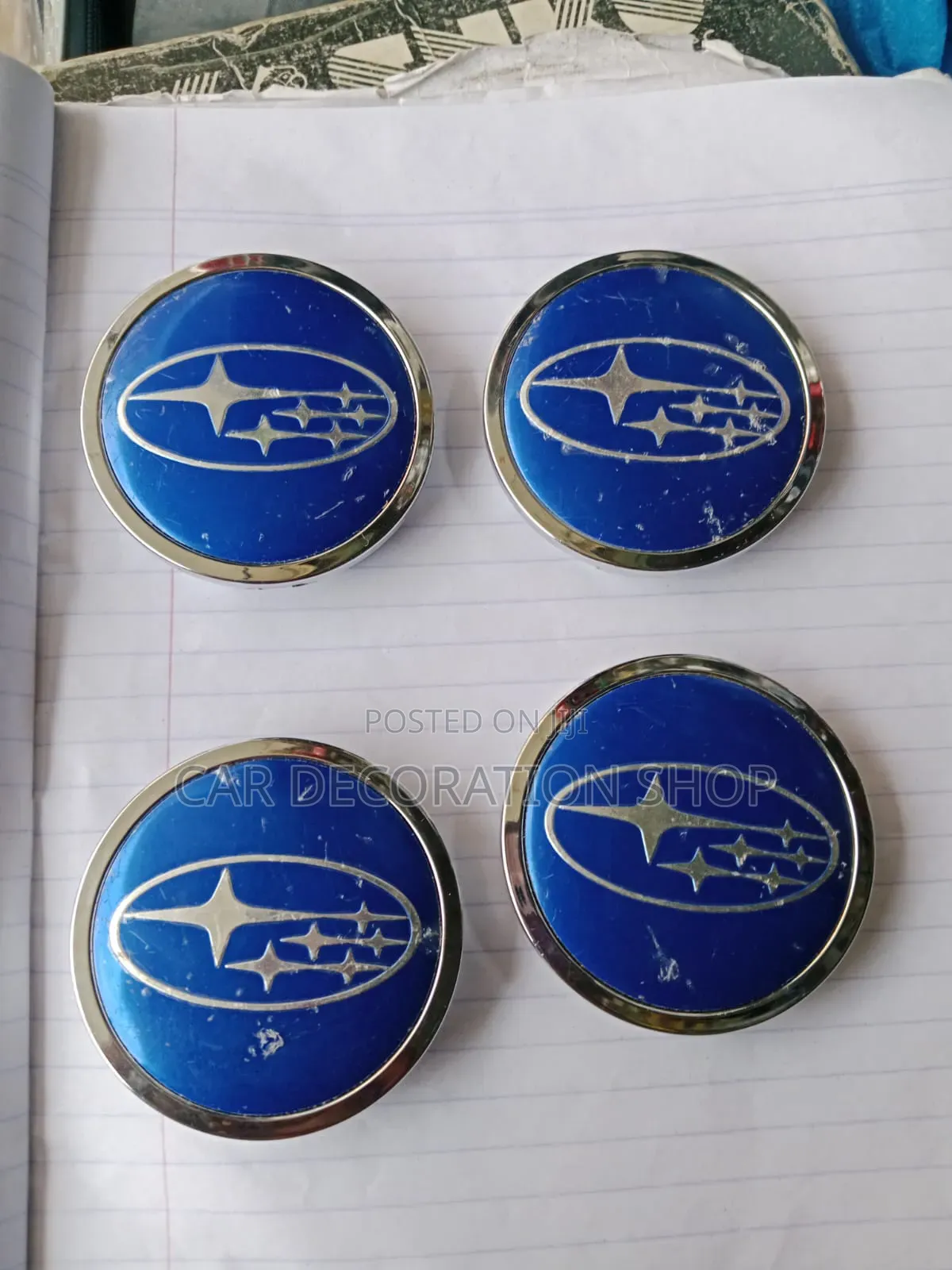 Blue Subaru Wheel Center Caps Featuring Classic Six Star Emblem