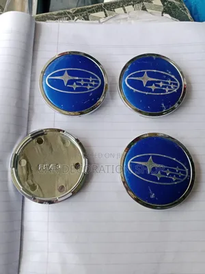 4pc Subaru Centre Rim Caps Blue Background Chrome Colored Logo