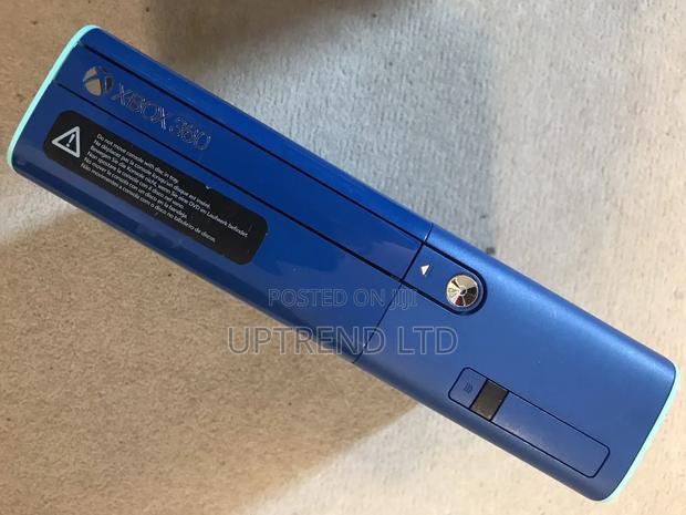 Chipped Xbox 360 E Console Blue Teal Limited Special Edition - main view
