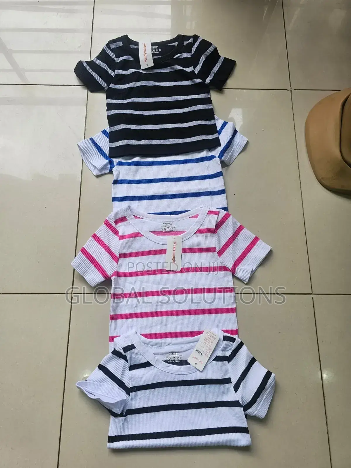 Versatile Knit Tops Available In White And Black Striped Patterns