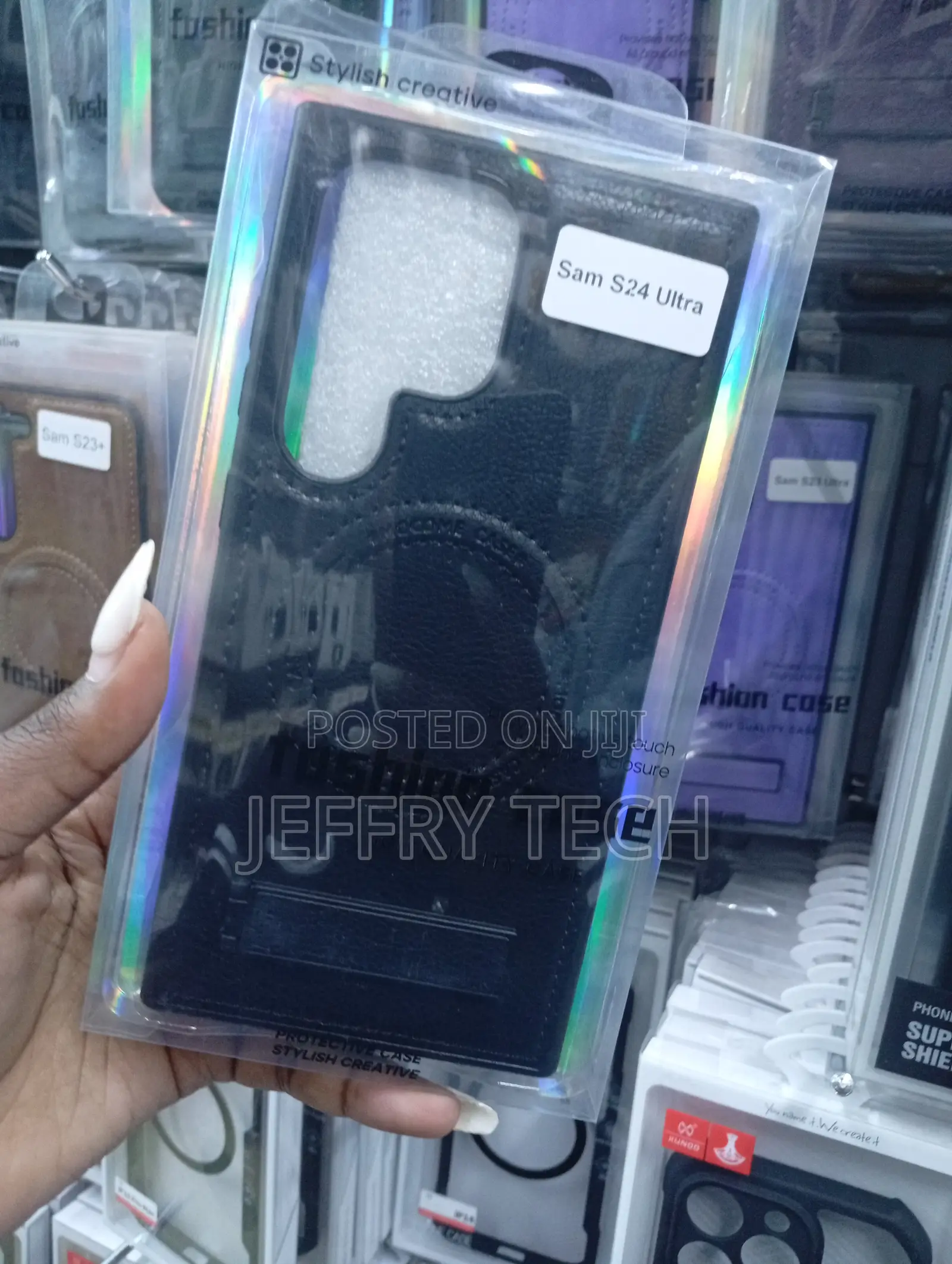 Black Faux Leather Magnetic Phone Case for a Samsung Galaxy S24 Ultra.