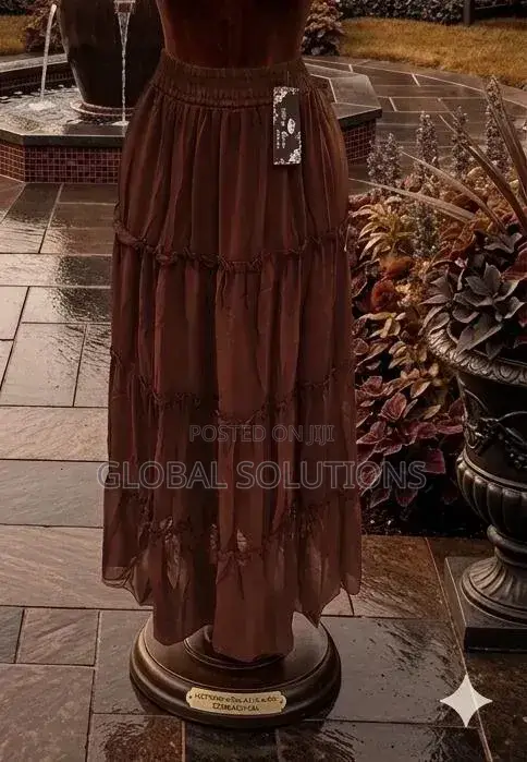Tiered Boho Maxi Skirt With a High Waist and a Flowy, Pleated Design