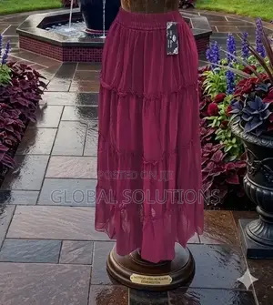 Tiered Boho Maxi Skirt With a High Waist and a Flowy, Pleated Design
