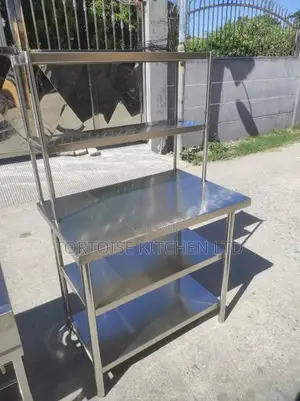 Stainless Steel Table Top With Multiple Shelves Size 1200mm by 550mm