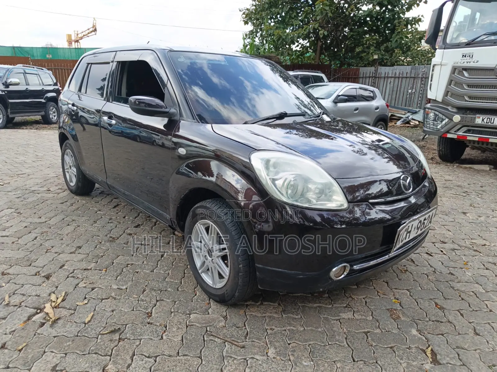 Mazda Verisa 2010 Brown