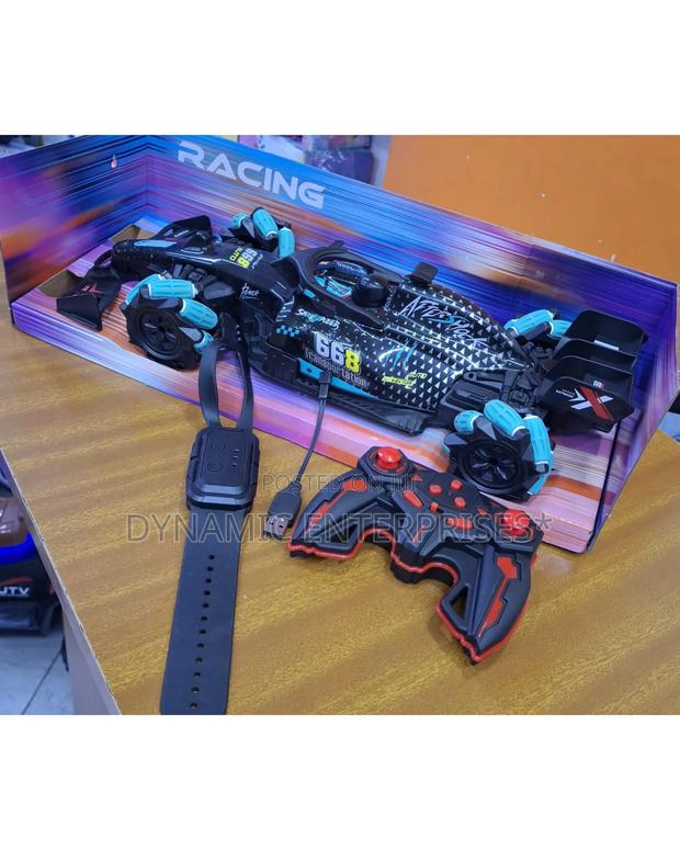 F1 Racing Remote Car With Smoke Effect
-Comes With Wrist Watch