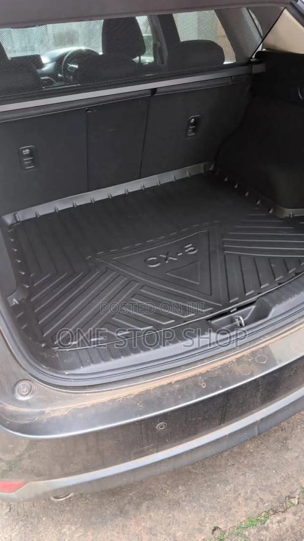 Cx_5 Trunk Boot Mat With Raised Ridges to Trap Dirt