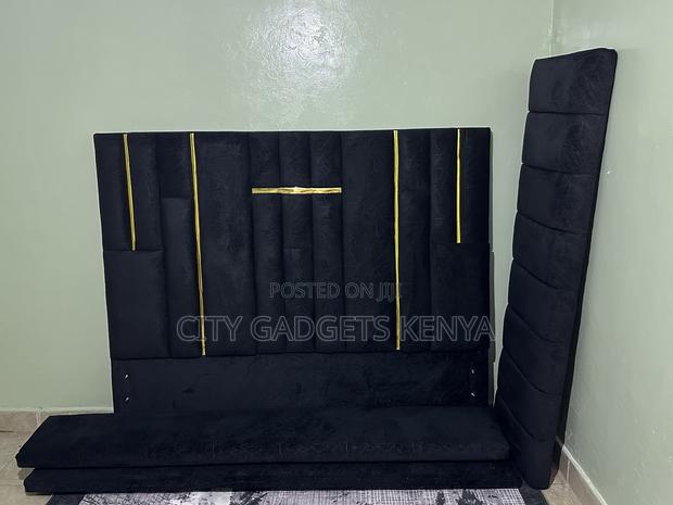 Modern Black Velvet Bed With a High Headboard