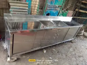 Stainless Steel Sink With Cabinets and Table Top