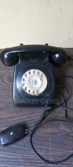 Vintage Rotary Dial Phones – 1950s Black Bakelite + 1970s Two-Tone Set