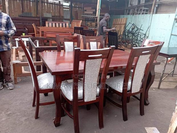 Brown and White Dinning Table
