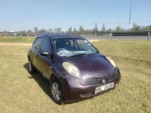 Nissan March 2003 Red