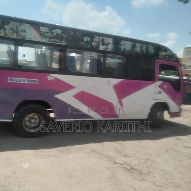 Isuzu NQR 2004 Pink - thumbnail 2