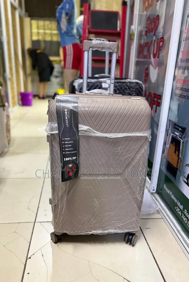 63 Cm Beige Large Size Rubber Unbreakable Rubber Suitcase
