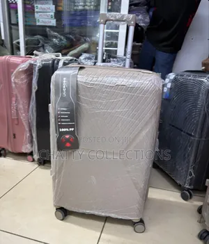 63 Cm Beige Large Size Rubber Unbreakable Rubber Suitcase