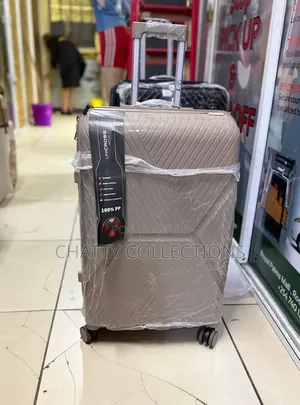 63 Cm Beige Large Size Rubber Unbreakable Rubber Suitcase
