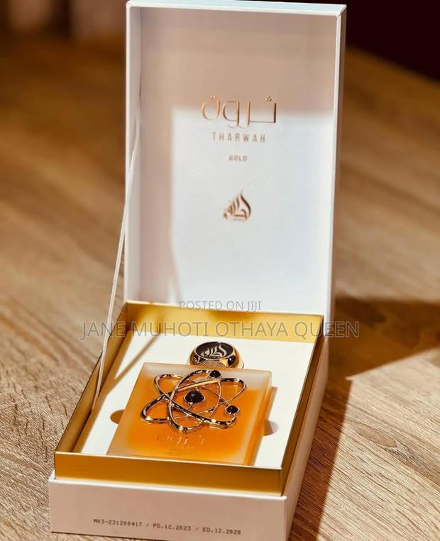 *Tharwah Gold by Lattafa Pride - thumbnail 2