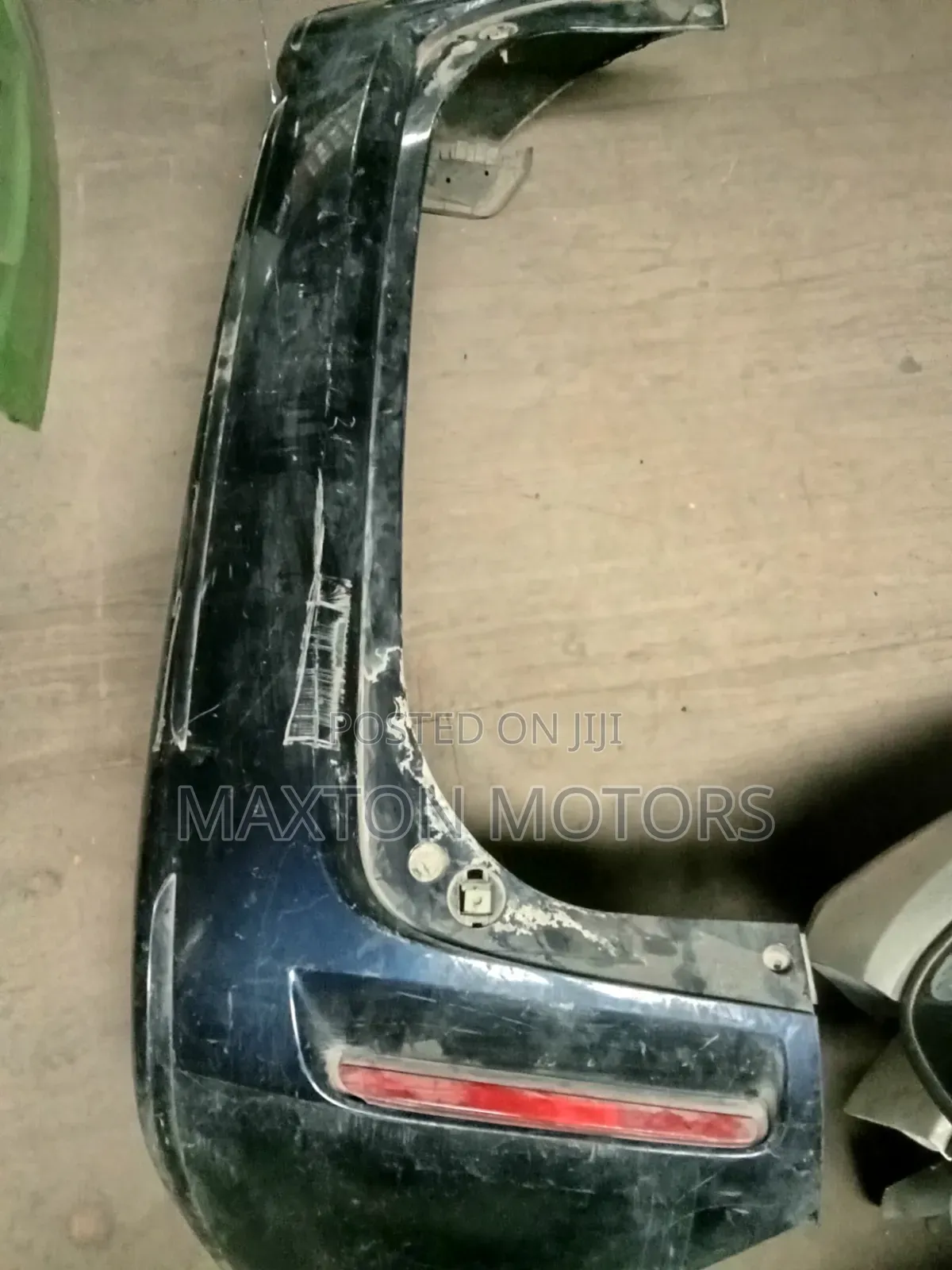 Mazda Biante Rear Bumper With Reflectors