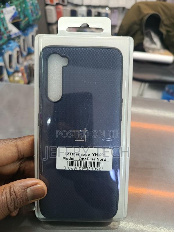 This Is a Oneplus Nord Leather Case With a Textured, Deep Blue Finish.