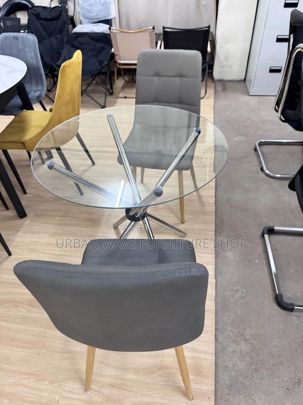 Grey Chairs Round Transparent Tables