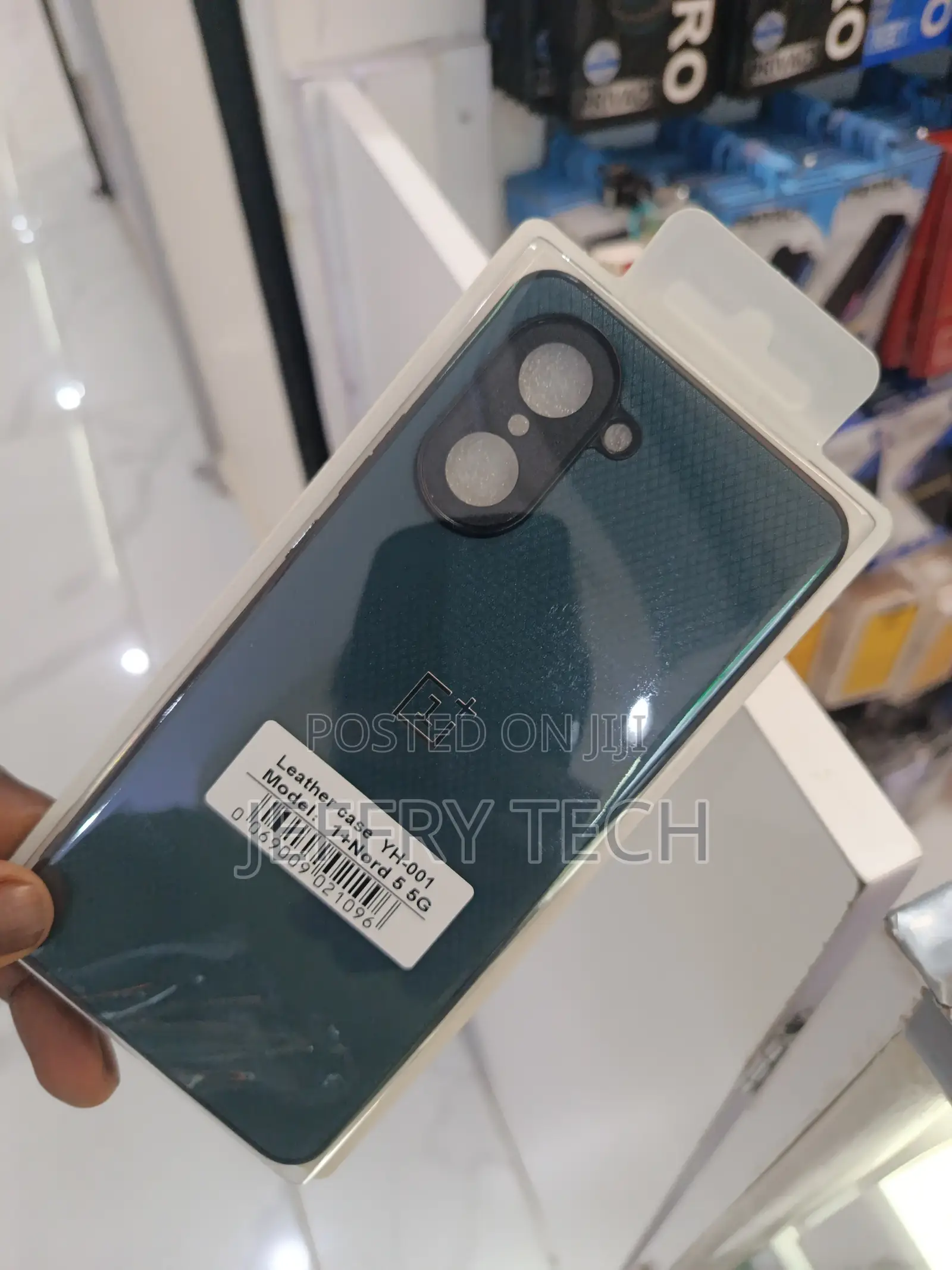 This Is a Dark Green Leather Case for a Oneplus Nord Ce 3 5g.