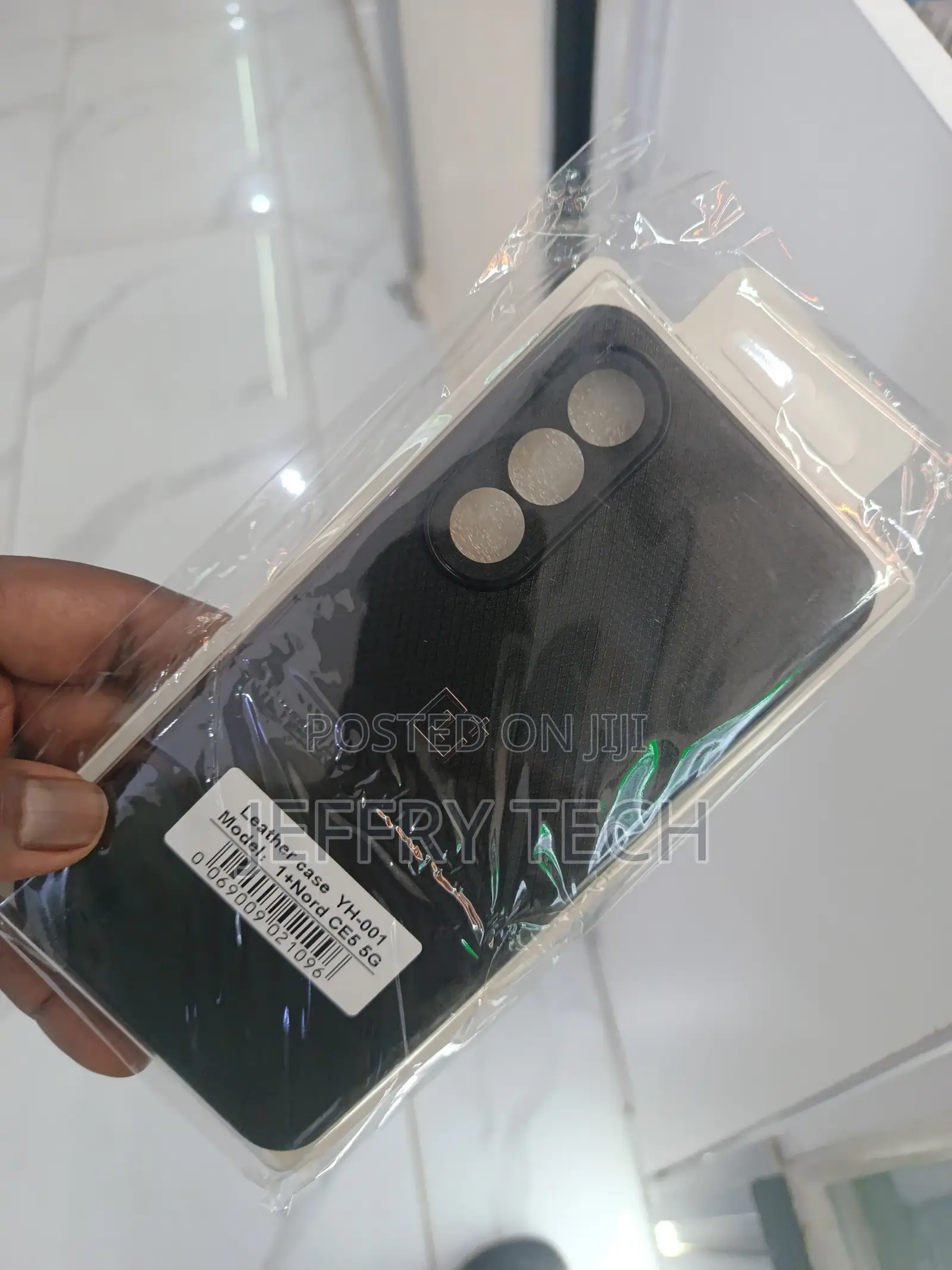 This Is a Black Leather Case for a Oneplus Nord Ce5 5g Smartphone.