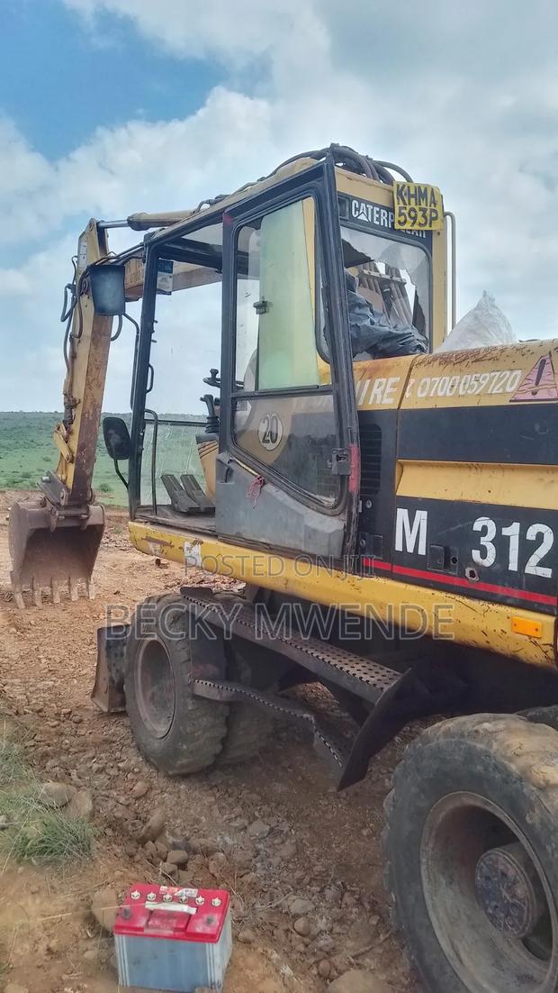 Caterpillar M312