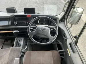 Toyota Coaster 2019 Silver