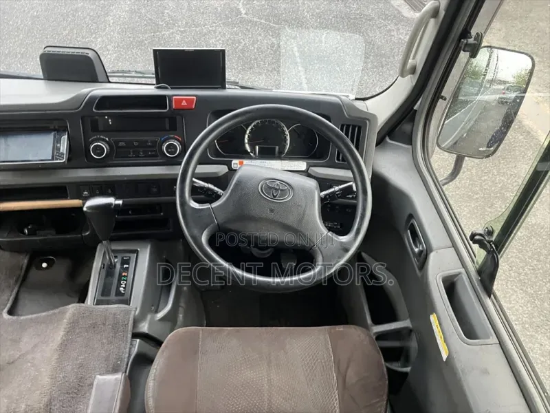 Toyota Coaster 2019 Silver