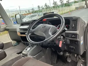 Toyota Coaster 2019 Silver