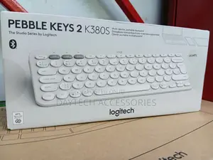 Logitech Pebble Keys 2 K380s Portable Bluetooth Keyboard in Off-White.