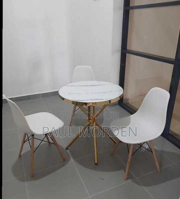 3_pcs White Plastic Dining Chairs Comes With Round Table