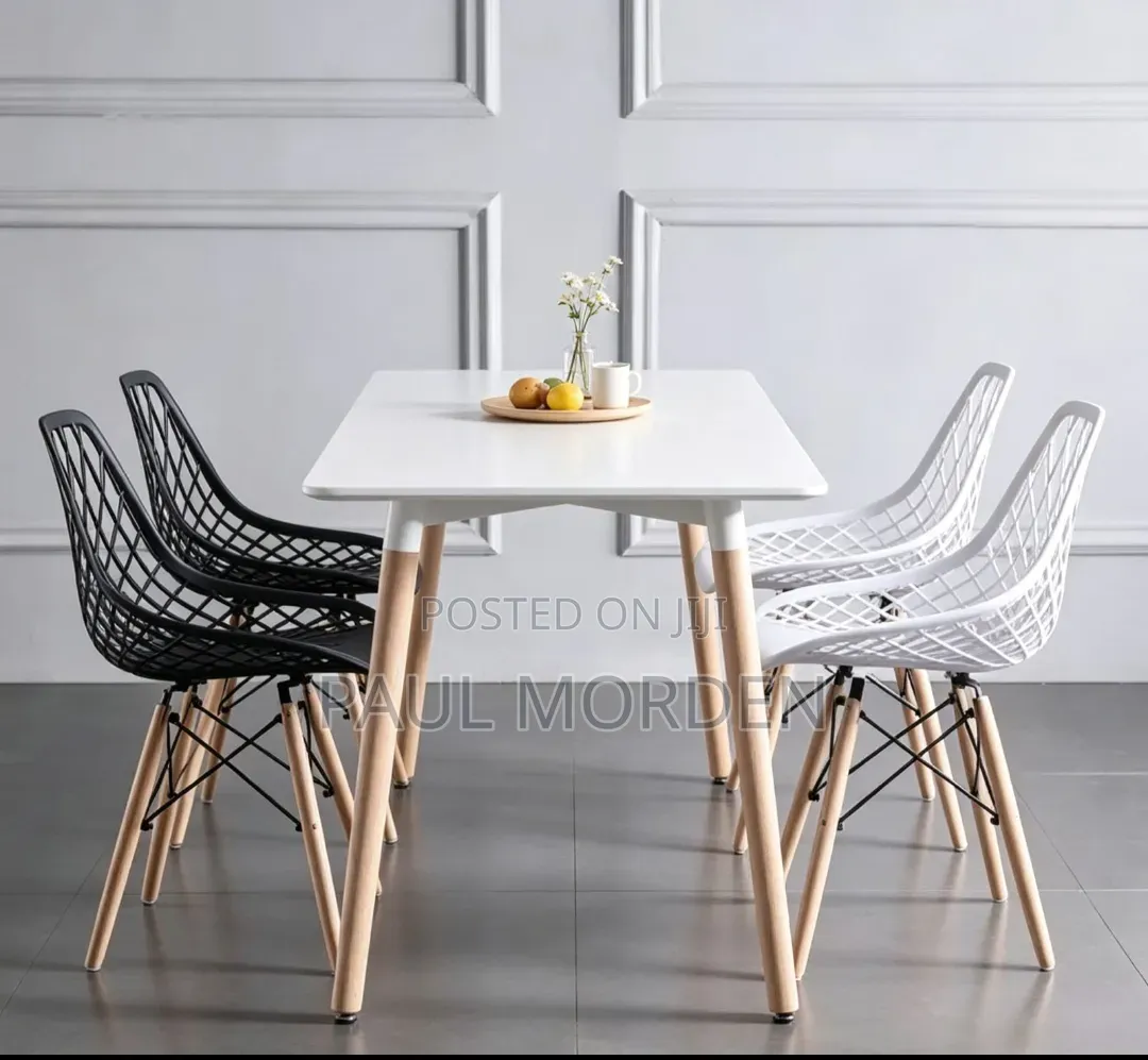 Rectangular White Table With 4 White Eames Chair in Stock