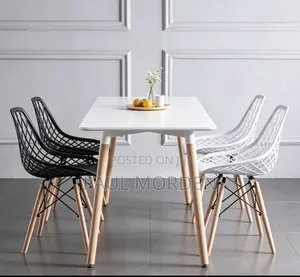 Rectangular White Table With 4 White Eames Chair in Stock