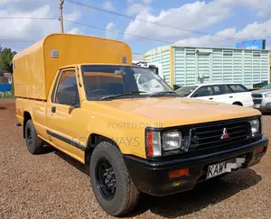 Mitsubishi L200 2006 Yellow