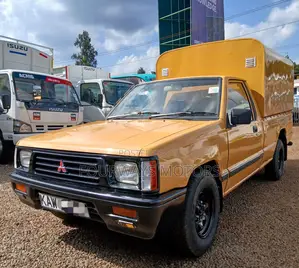 Mitsubishi L200 2006 Yellow
