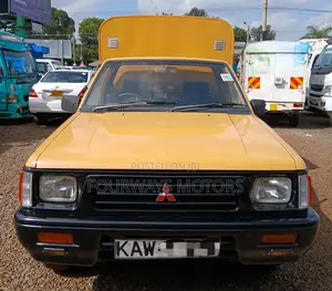 Mitsubishi L200 2006 Yellow