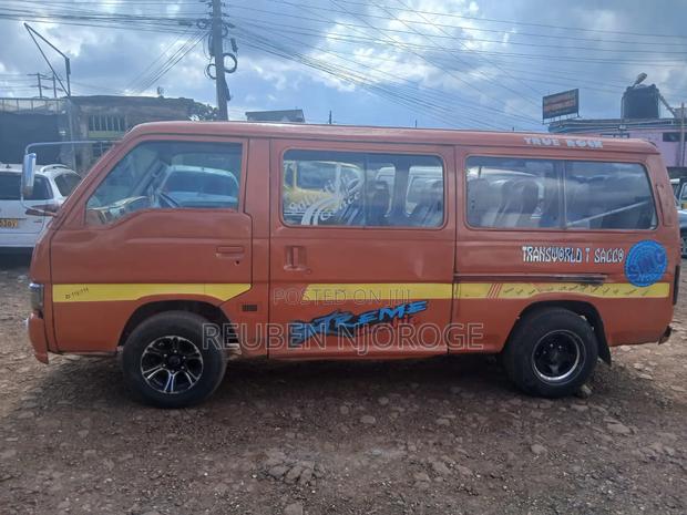 Nissan Caravan (Urvan) 2003 Orange - thumbnail 6