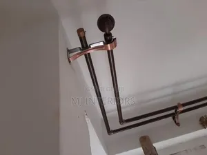 Professional Jua Kali Curtain Rod Installation